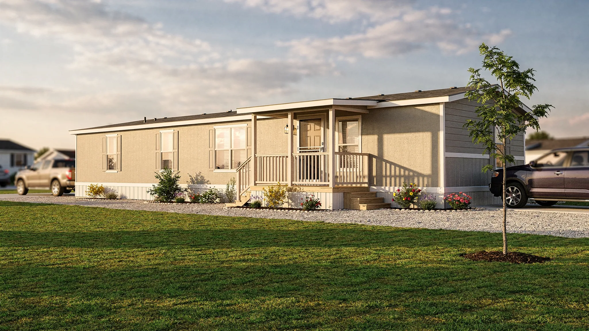 A single wide manufactured home on a clean lot near San Antonio, with a small front porch, gravel driveway, neat landscaping, and warm daylight showing an affordable homeownership setting.