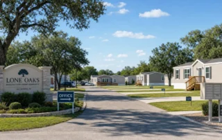 A San Antonio manufactured home community entrance with lot markers, mailboxes, and a model home down the street.