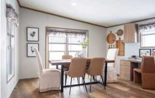 Dining area with a table for six by the windows