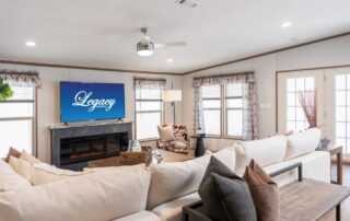 Living room toward the patio doors and fireplace