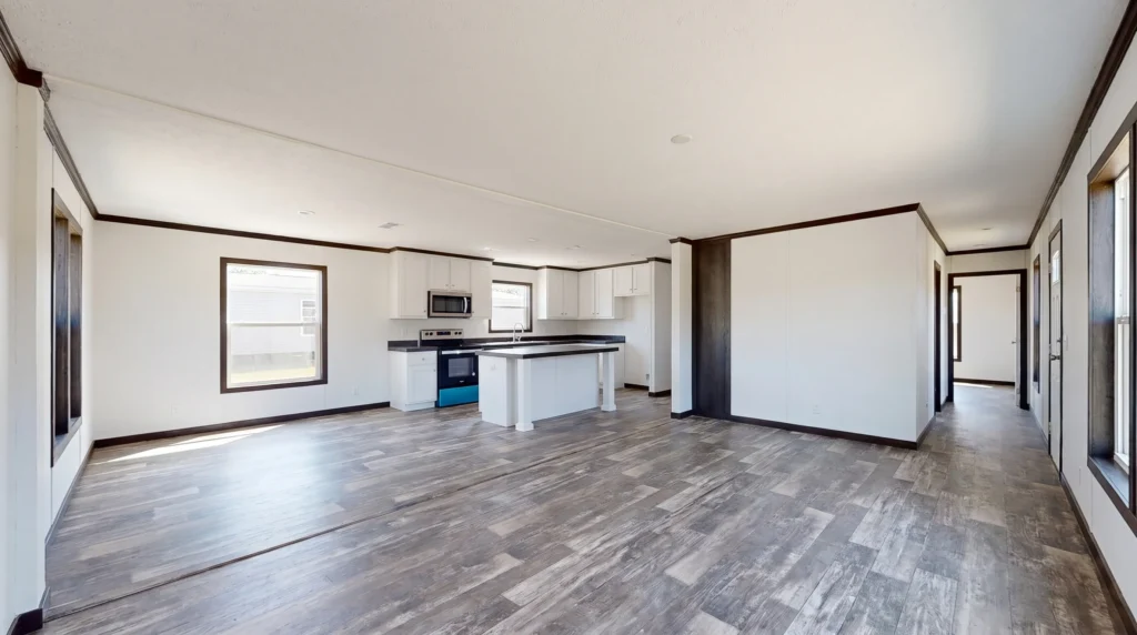 The connected rooms and bedroom hallway of a manufactured home reveal how its floor plan supports everyday family routines.